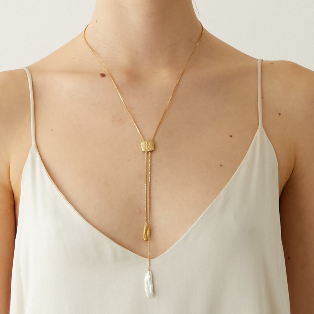 Collier de perles à long fil en or 18 carats