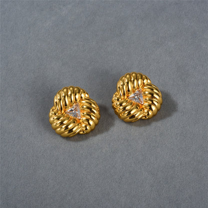 Boucles d'oreilles en or 18 carats avec zircons en forme de fleur
